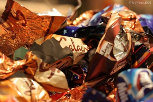 Waste containers and safety signage at a loading area